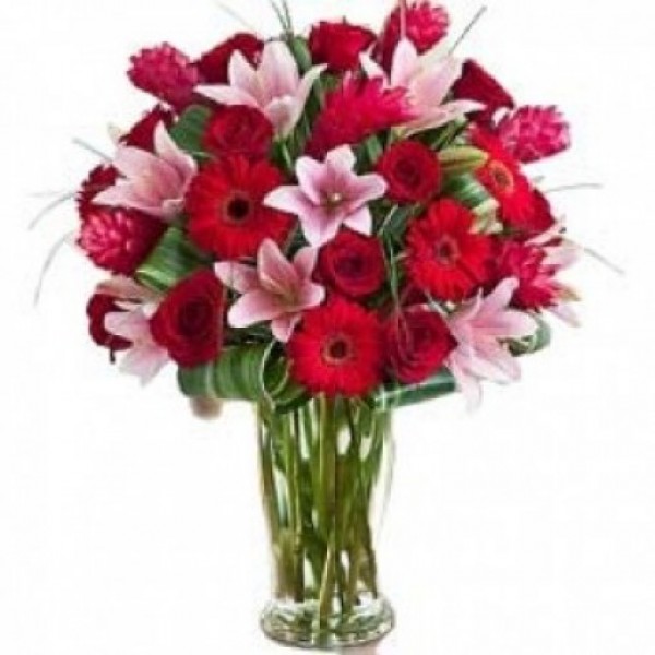 5 Asiatic Pink Lilies and 8 Red Gerberas and 10 Red Roses in a Glass Vase