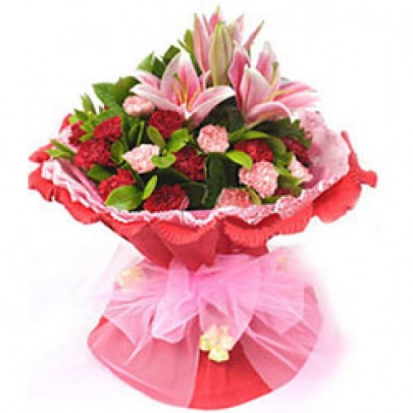  20 Red and Pink Carnations and 2 Pink Asiatic Lilies with Paper Packing