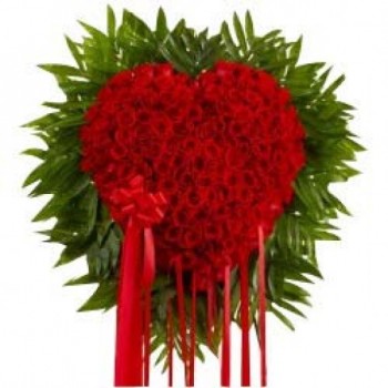 a Heart-shaped floral arrangement of 80 Red Roses