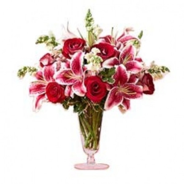 5 Pink Asiatic Lilies and 8 Dark Pink Roses and 4 White Glads in a Glass Vase