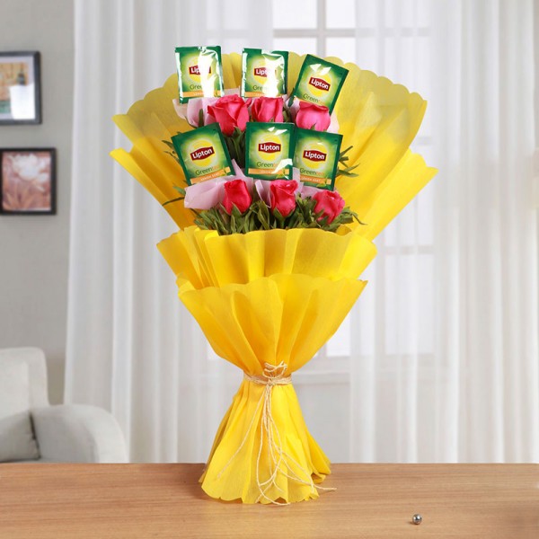 One Bouquet of 6 Dark Pink Roses and 6 Sachet of Lipton Green Tea with Yellow Tissue Packing