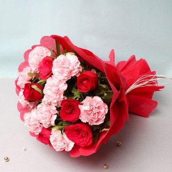  6 Red Roses and 9 Pink Carnations in a Paper Packing