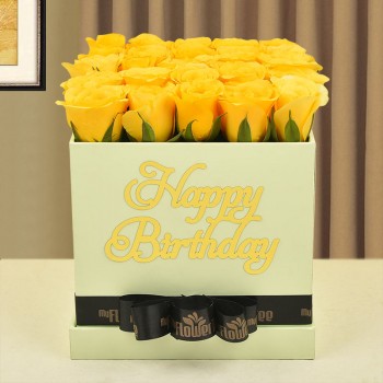 30 yellow roses in happy birthday lime green box tied with black ribbon
