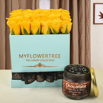 30 yellow roses in blue box tied with black ribbon with Chocolate truffle cake in a jar