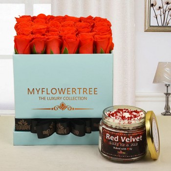  30 orange roses in blue box tied with black ribbon with Red Velvet cake jar
