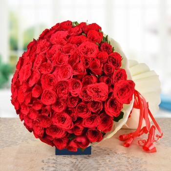 100 Red Roses in Paper Packing