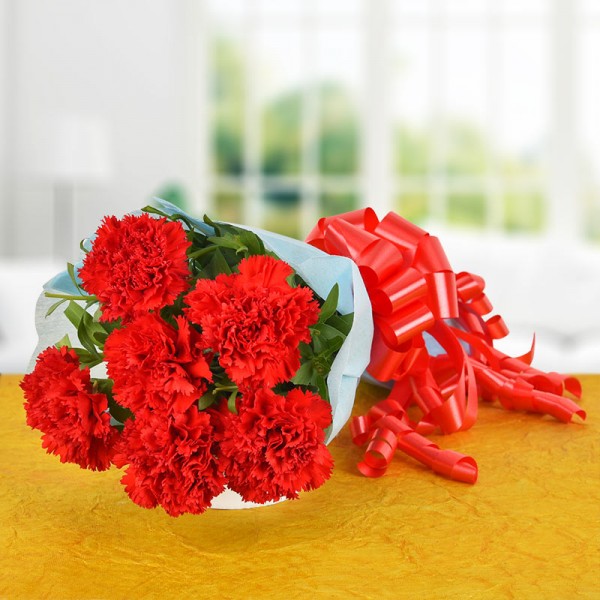 6 Red Carnations with Paper Packing