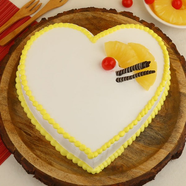 Half Kg Heart Shape Pineapple Cake