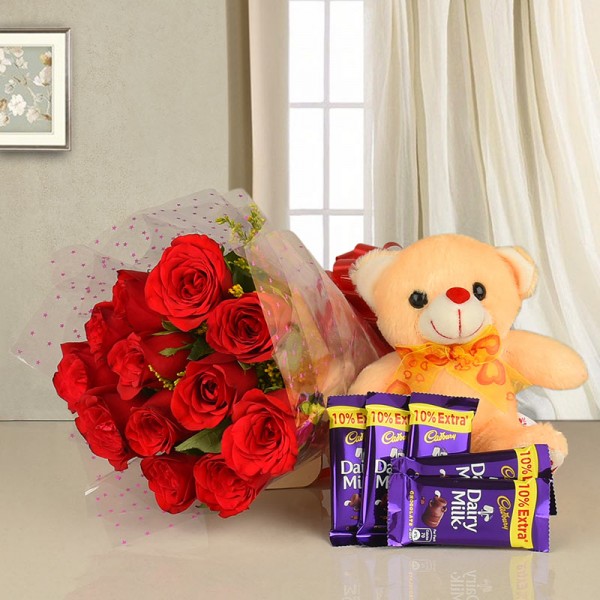 12 Red Roses in Cellophane Packing with 5 Cadbury's DairyMilk Chocolates (13.2 gms each) and 1 Teddy Bear (6 inches)