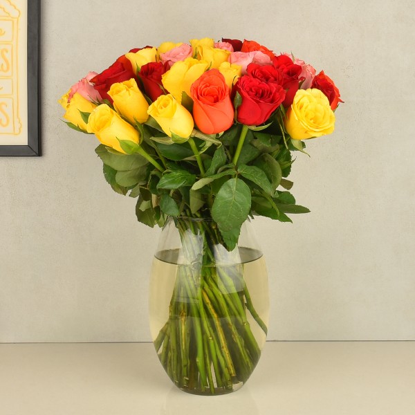 50 Assorted Roses in a Glass Vase