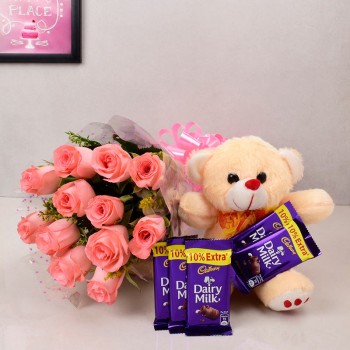 12 Pink Roses with Teddy Bear (6 inches) and 5 Cadbury's DairyMilk Chocolates (13.2 gms each)
