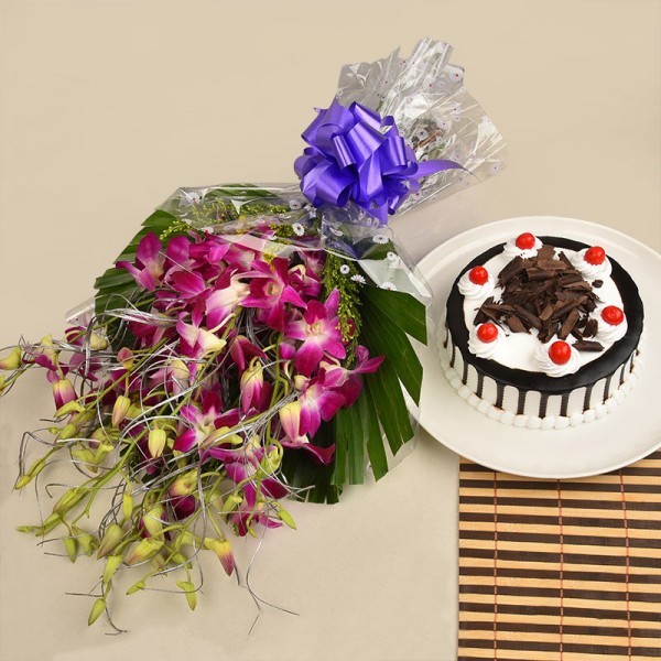 8 purple orchids with Half kg blackforest cake