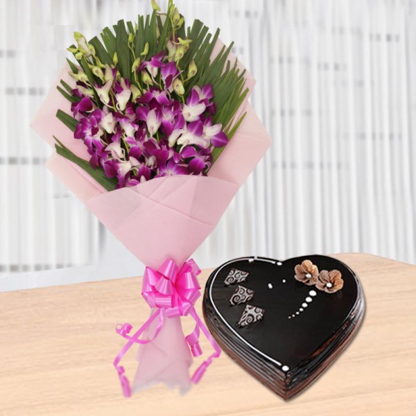  6 Purple Orchids with 1 Kg Heart Shape Chocolate Cake in Paper Packing