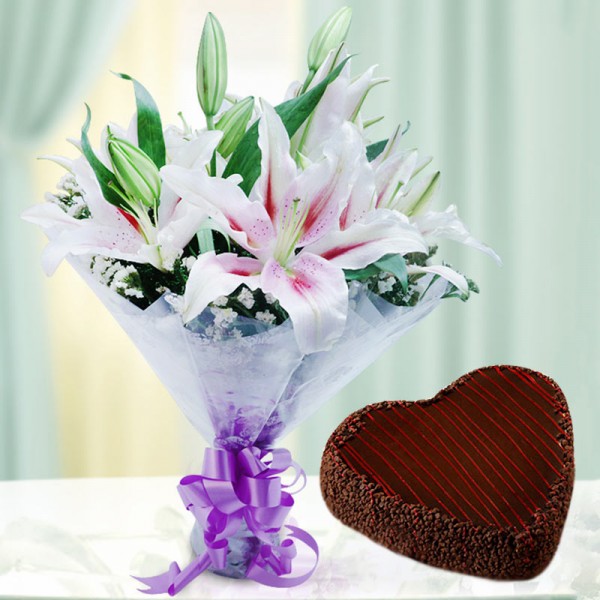 6 Pink Oriental Lilies with 1 Kg Heart Shape Chcochip Chocolate Cake in Cellophane Packing