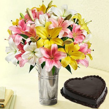 7 Assorted Asiatic Lilies with 1 Kg Heart Shape Chocolate Cake in a Vase