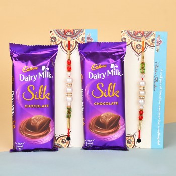 2 Pearl Rakhis N Dairy Milk Silk Chocolates