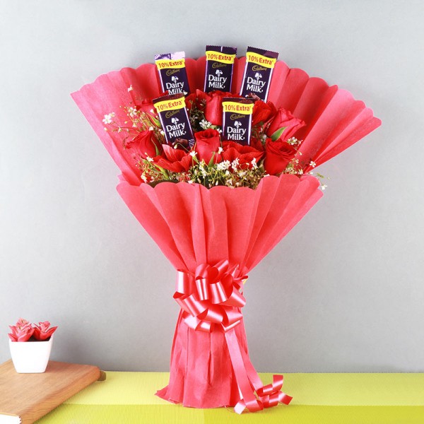  One Bouquet of 6 Red Roses and 5 Dairy Milk (13.2 gm) Chocolates 