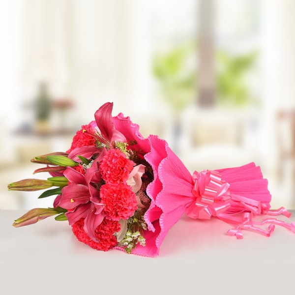 10 Pink Carnations and 6 Pink Asiatic Lilies in Paper Packing