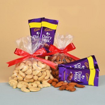 4 Cadbury Dairy Milk Chocolates and pack of 100 gm almond and 100 gm cashew nut