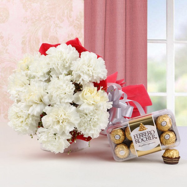 12 White Carnations in Red Paper Packing with A box of 16 pcs of Ferrero Rocher Chococlates