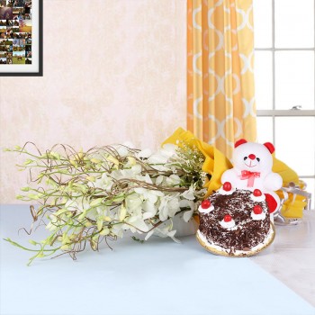6 White Orchids in Yellow Paper packing with Black Forest Cake (Half Kg) and Teddy Bear (6 inches)