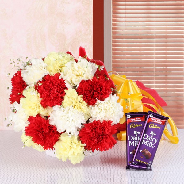 15 Carnations (Yellow, White and Red) in Red Paper packing with 2 Cadbury's Dairy Milk Chocolates (25gms each)