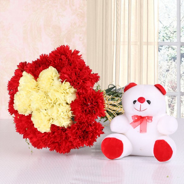 16 Carnations (Yellow and Red) in Yellow Raffia Knot with Teddy Bear (6 inches)