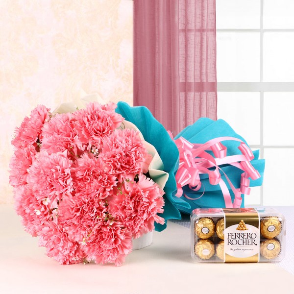 12 Pink Carnations in Blue and White Paper Packing with a box of 16 pcs of Ferrero Rocher Chocolates