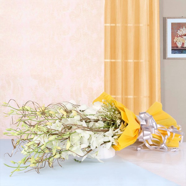 6 White Orchids in Yellow Paper packing