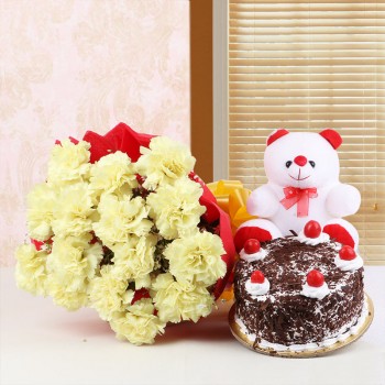 15 Yellow Carnations in Red Paper Packing with Black Forest (Half Kg) and Teddy Bear (6 inches)