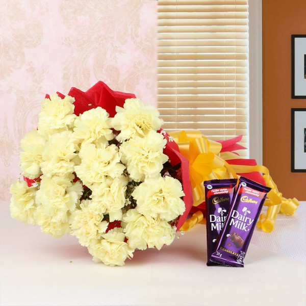 15 Yellow Carnations in Red Paper Packing with 2 Cadbury's DairyMilk Chocolates (25gms each)