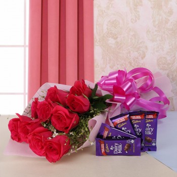 10 Hot Red Roses in Pink Paper, Pink Bow with 5 DairyMilk (13gms each)