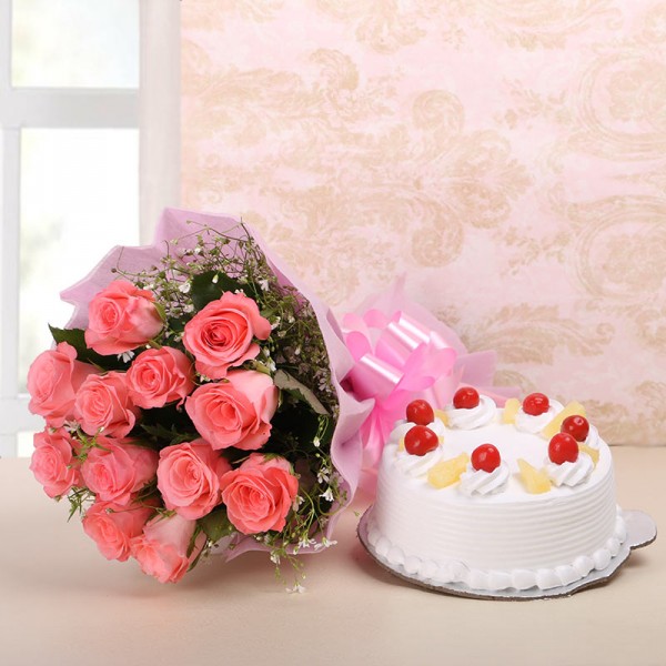 10 Pink Roses in Pink Paper with Pineapple Cake (Half Kg)