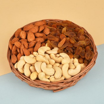  A Cane Basket containing Almonds (100 gms), Raisins (100 gms) and Cashew Nuts (100 gms)