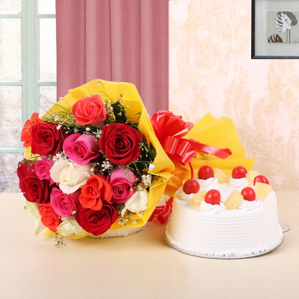 12 Assorted Roses in Yellow Paper and Red Bow with Pineapple Cake (Half Kg)
