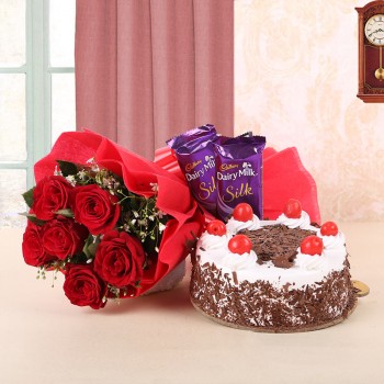 6 Red Roses in Red Paper and Red Bow with Black Forest Cake (Half Kg) and 2 Cadbury's Dairy Milk Silk (60gms each)