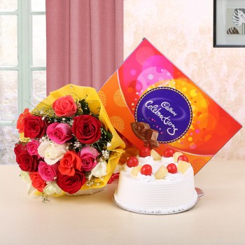12 Assorted Roses in Yellow Paper with Pineapple Cake (Half Kg) and Cadbury's Celebrations (131.3gms)