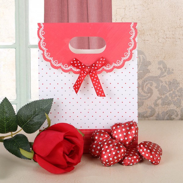 5 Assorted Chocolates with 1 stick of Artificial Rose in a Paper Bag