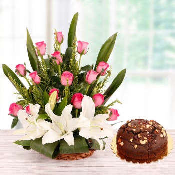 Floral Basket Arrangement in 15 Pink Roses and 2 White Asiatic Lilies with Half Kg Plum Cake