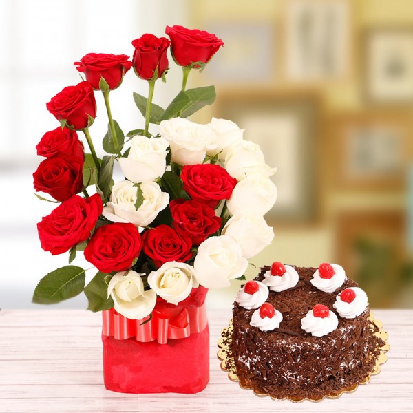22 Roses( Red and White ) in a Glass Vase with Half Kg Black Forest Cake