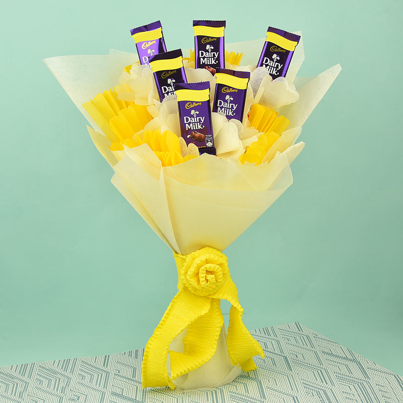 Bouquet of 6 Dairy Milk Chocolates in white and yellow paper packing