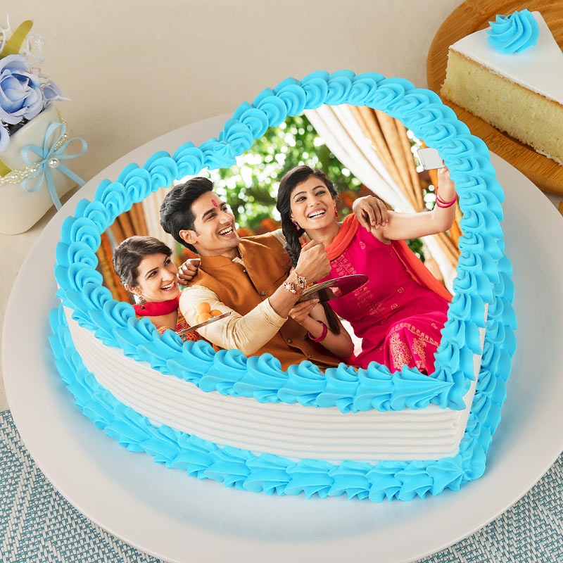 1 Kg Heart Shape Photo Pineapple Cake For Rakhi