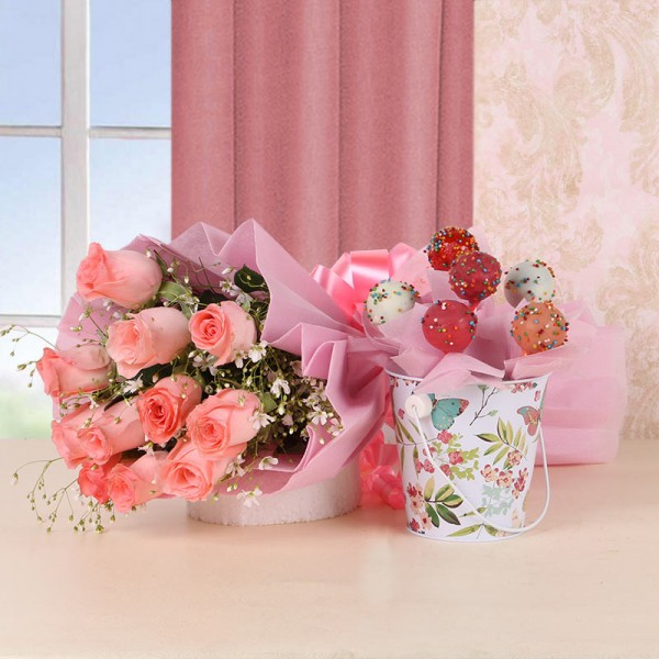 12 Pink Roses in Pink Paper with Arrangement of 6 Cake Pops and 1 Tin Bucket