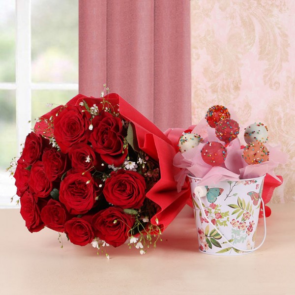 12 Red Roses in Red Paper with Arrangement of 6 Cake Pops and 1 Tin Bucket