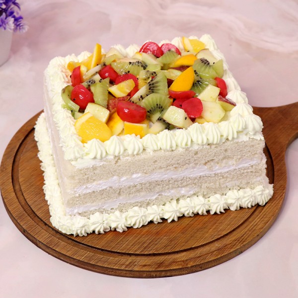 Buy/Send Mothers Day Spl Pineapple Cake with Flowers by FNP Online- FNP