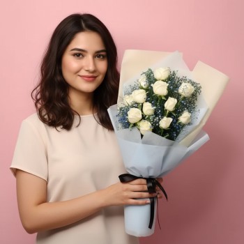 12 White Roses wrapped in blue special paper