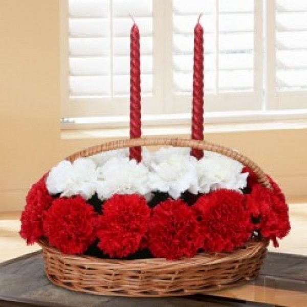 20 Carnations ( White and Red) in Cane Basket with Handle and 2 Spiral Candles