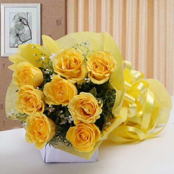  8 Yellow Roses in Paper Packing