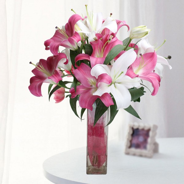 3 Pink Pink Oriental Lilies with 2 White Oriental Lilies in Square Glass Vase 