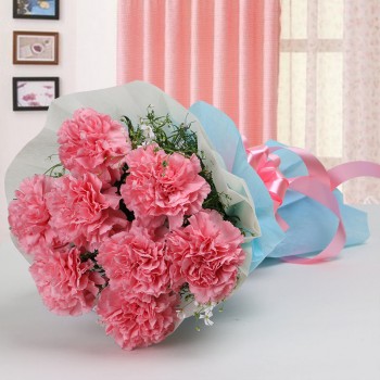 8 Pink Carnations in Paper Packing